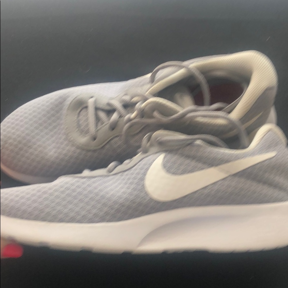 Grey Nike Tanjun tennis shoes, size 8.5